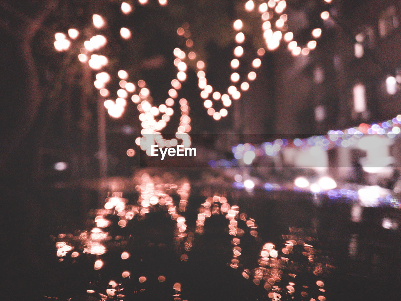 Defocused image of illuminated christmas lights