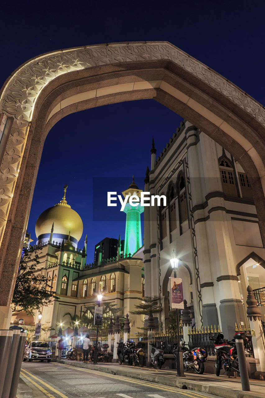 ILLUMINATED BUILDINGS AT NIGHT