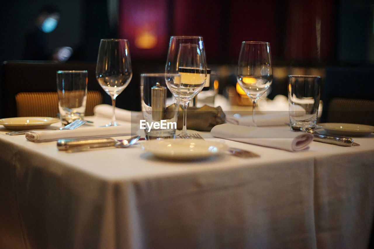 Wine glasses on table in restaurant