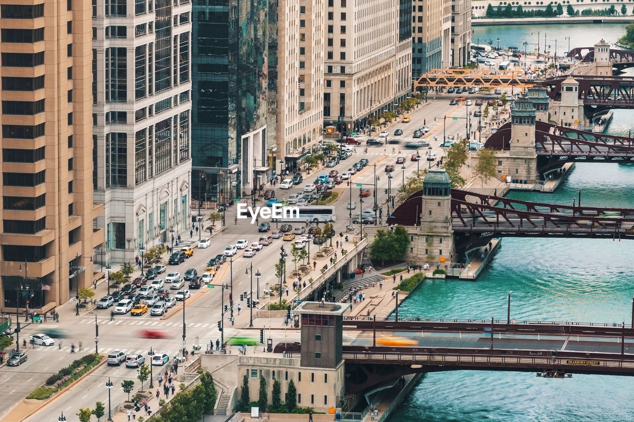 High angle view of bridges and buildings in city