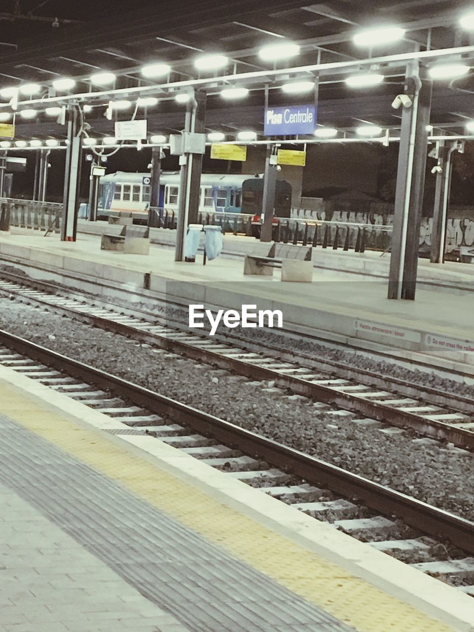 TRAIN AT RAILROAD STATION PLATFORM