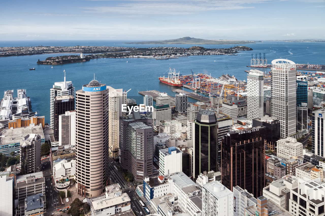 HIGH ANGLE VIEW OF BUILDINGS AGAINST SKY