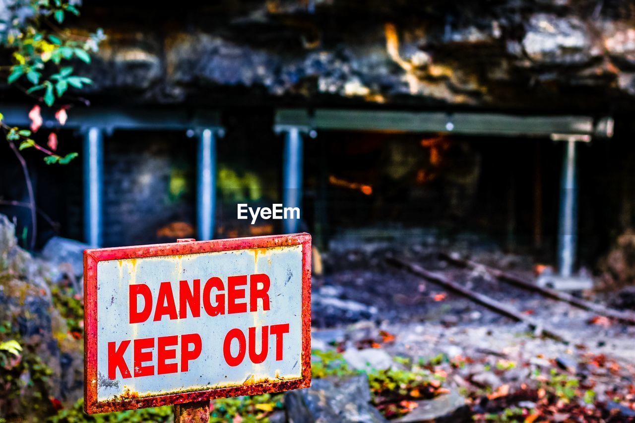 Close-up of warning sign at an abandoned coal mine