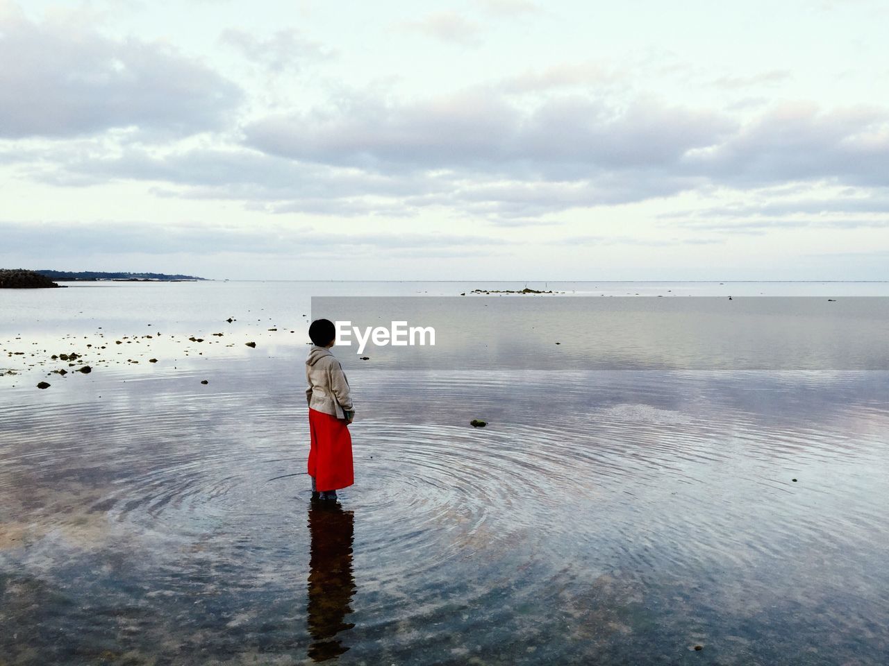 Side view of woman in calm sea