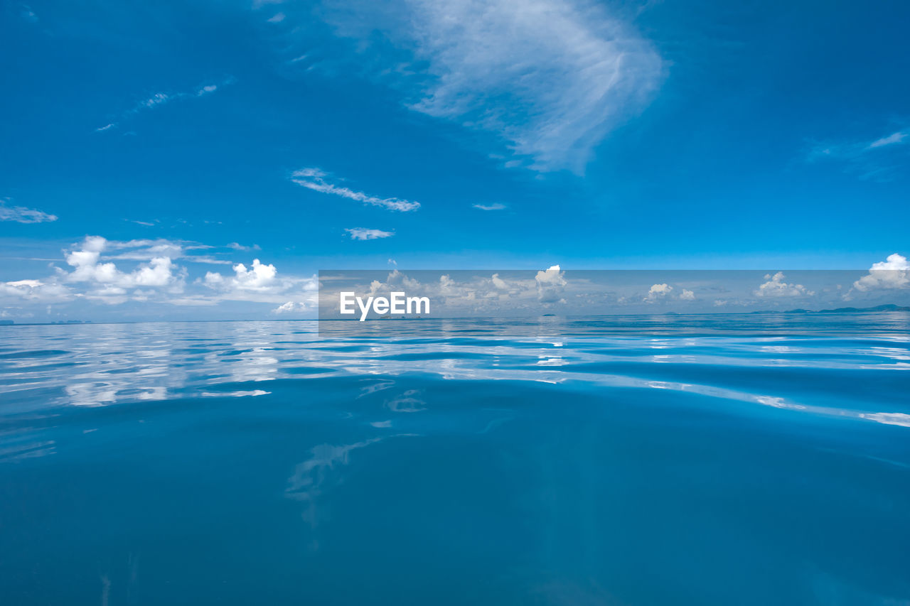 ocean, water, horizon, wave, sky, sea, wind wave, blue, nature, cloud, environment, beauty in nature, azure, reflection, scenics - nature, no people, outdoors, sunlight, tranquility, motion, travel, horizon over water, underwater, seascape, landscape, travel destinations, tranquil scene, day, cold temperature, land