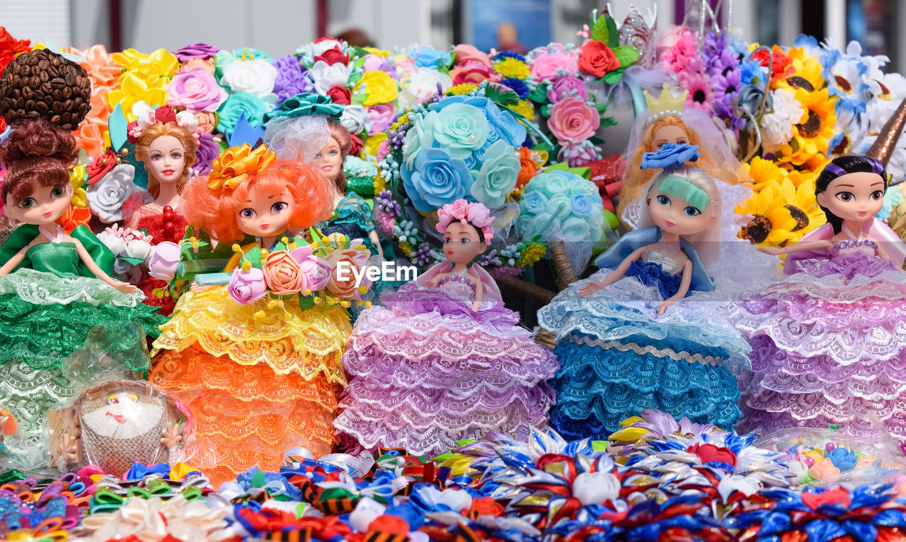 Close-up of multi colored toys for sale at market