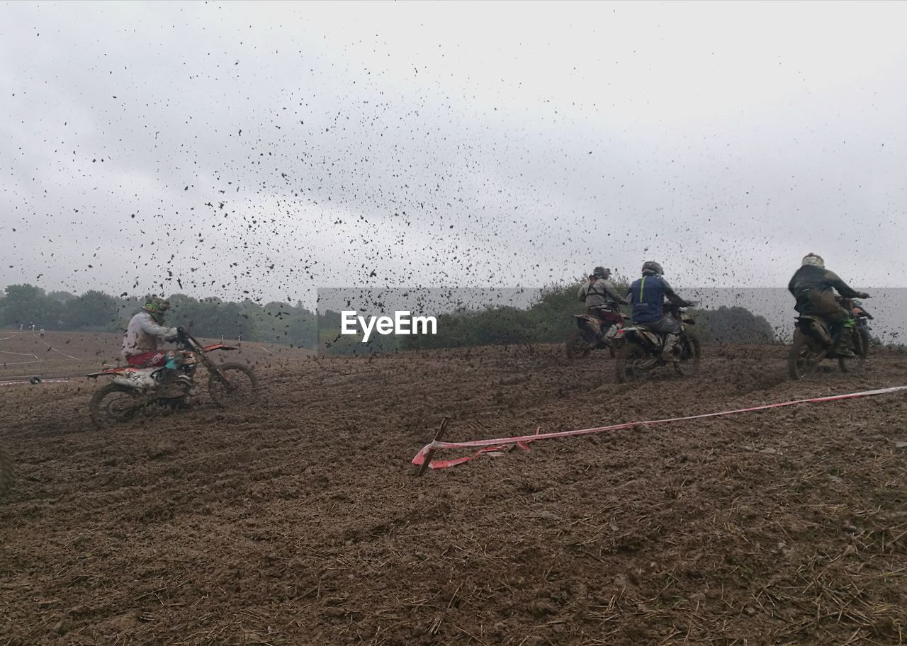 PEOPLE WORKING ON FIELD