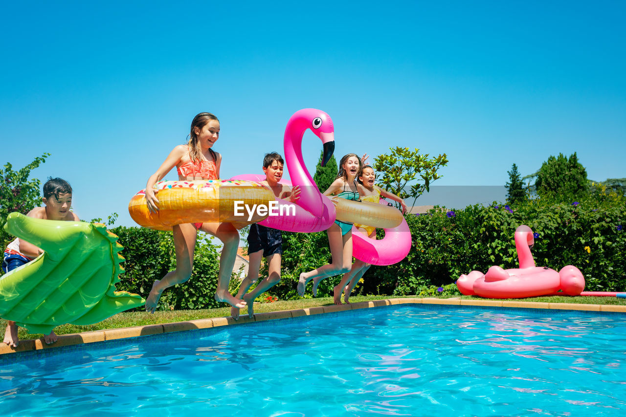 Group of people at swimming pool