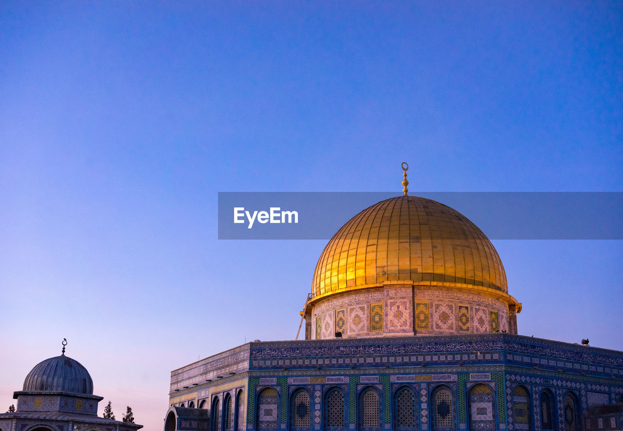 View of masjidil aqsa mosque against clear blue sky