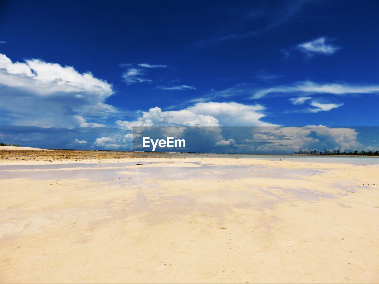 VIEW OF DESERT AGAINST BLUE SKY