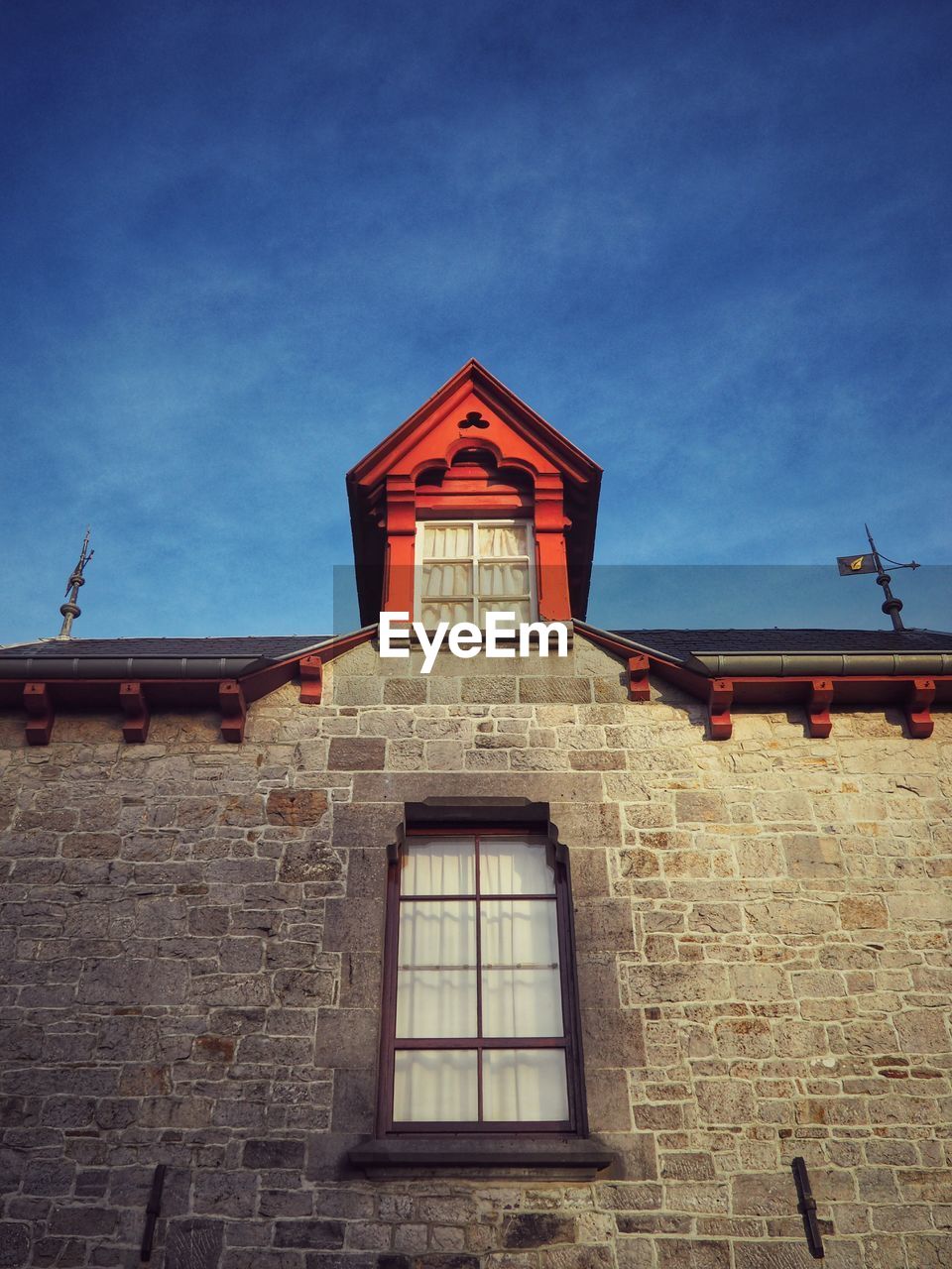 Low angle view of old building against sky