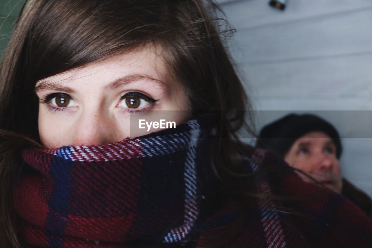 Close-up of young woman looking away