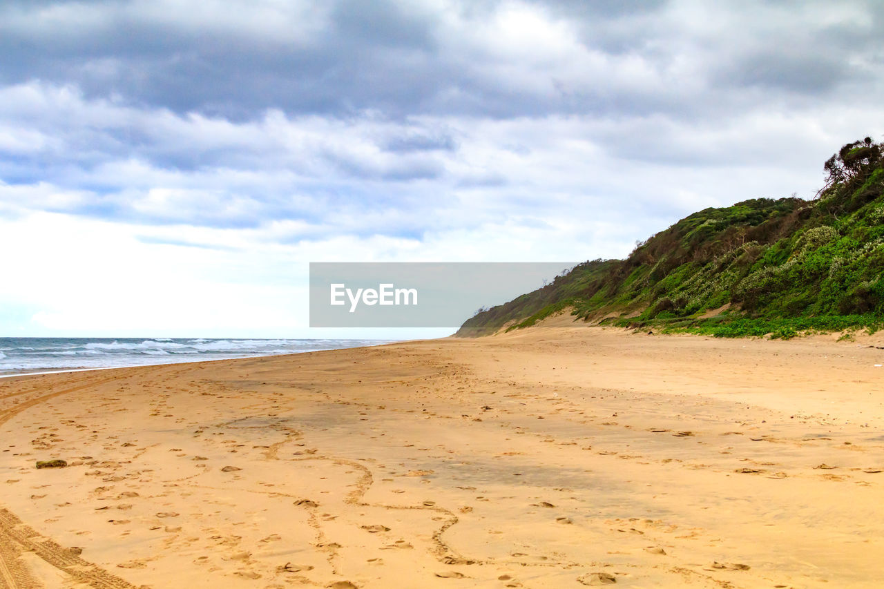 Scenic view of beach against sky