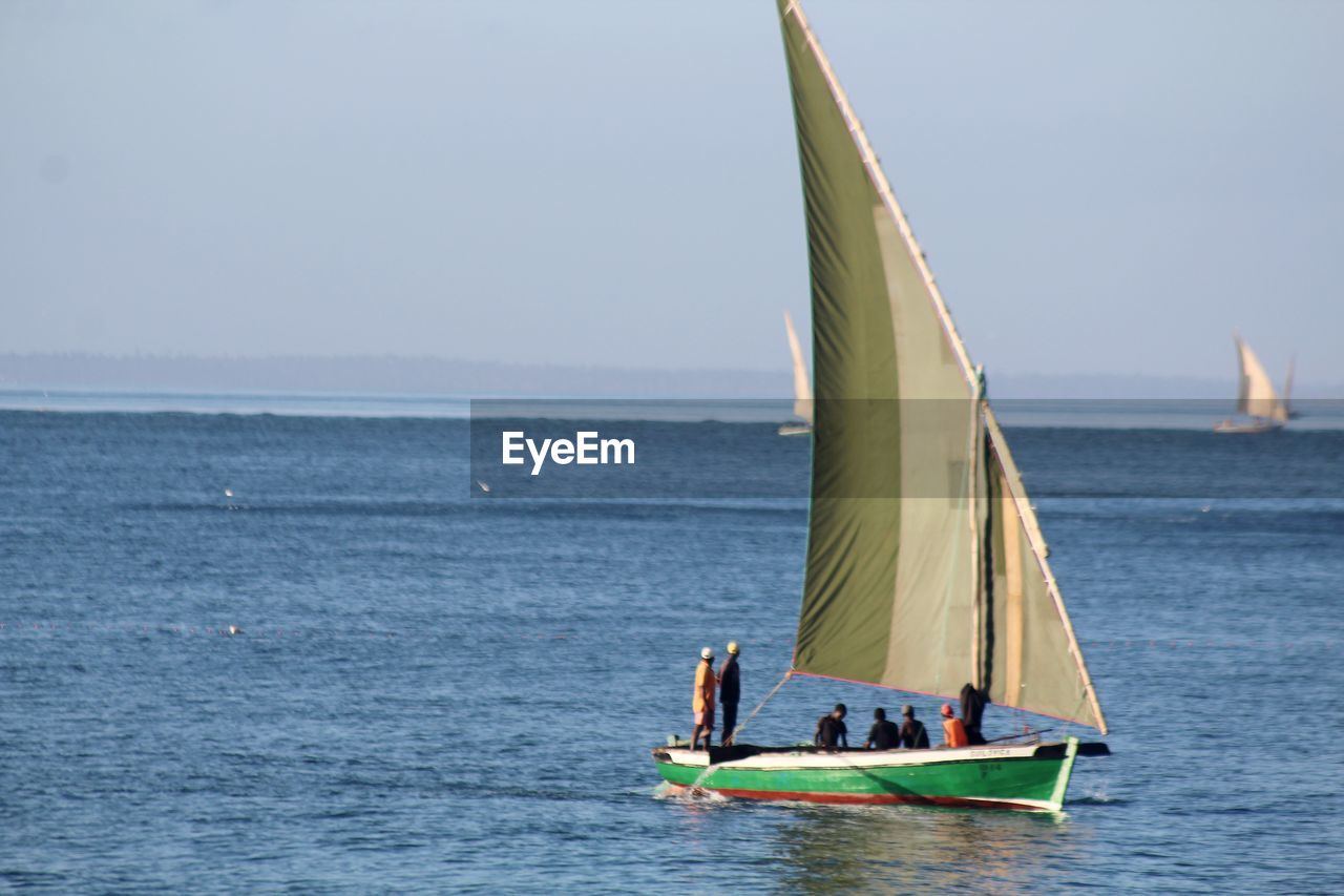 Boat in sea against sky