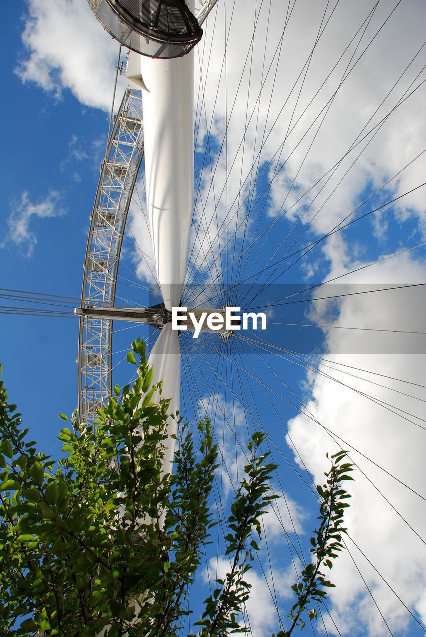 Low angle view of ferries wheel against the sky