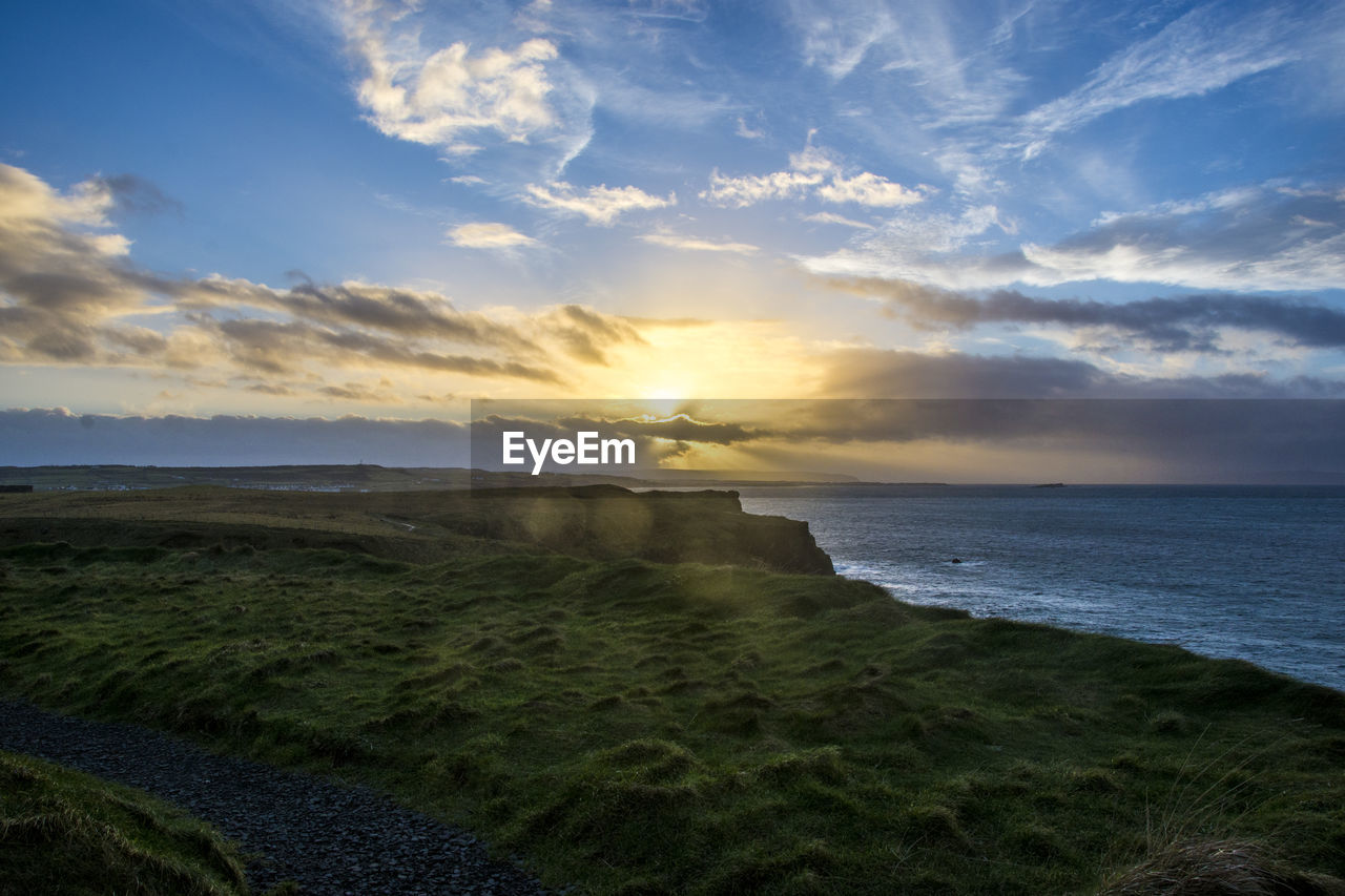 Scenic view of sea against sky during sunset