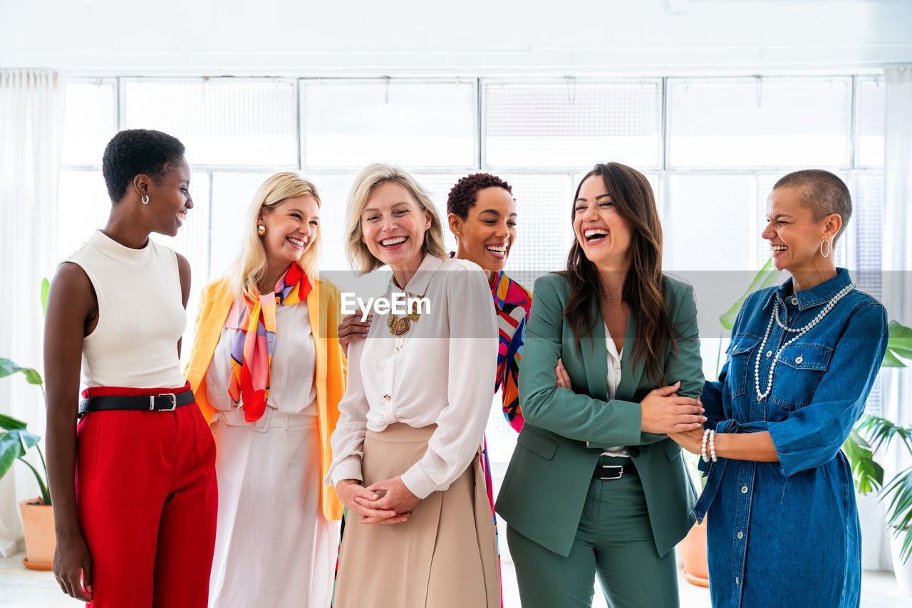 business colleagues standing in meeting