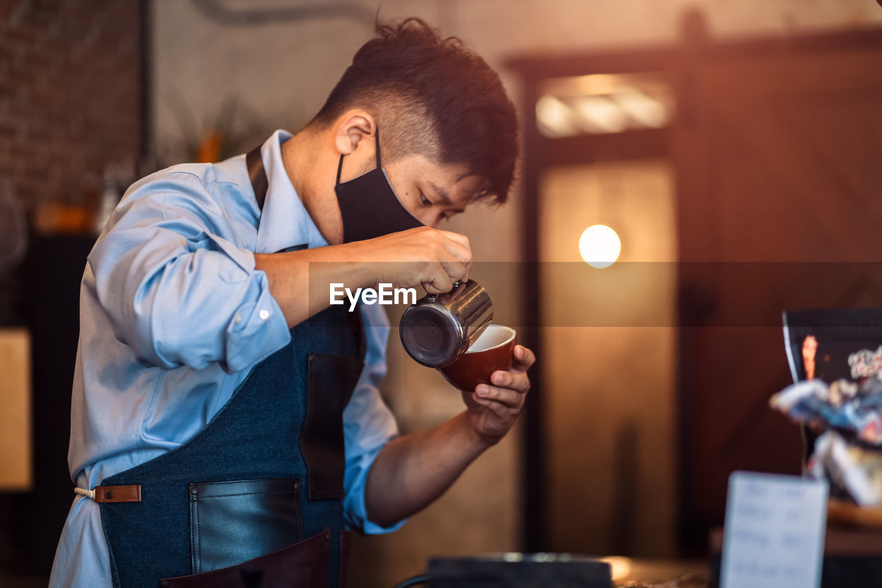 Young man drinking coffee