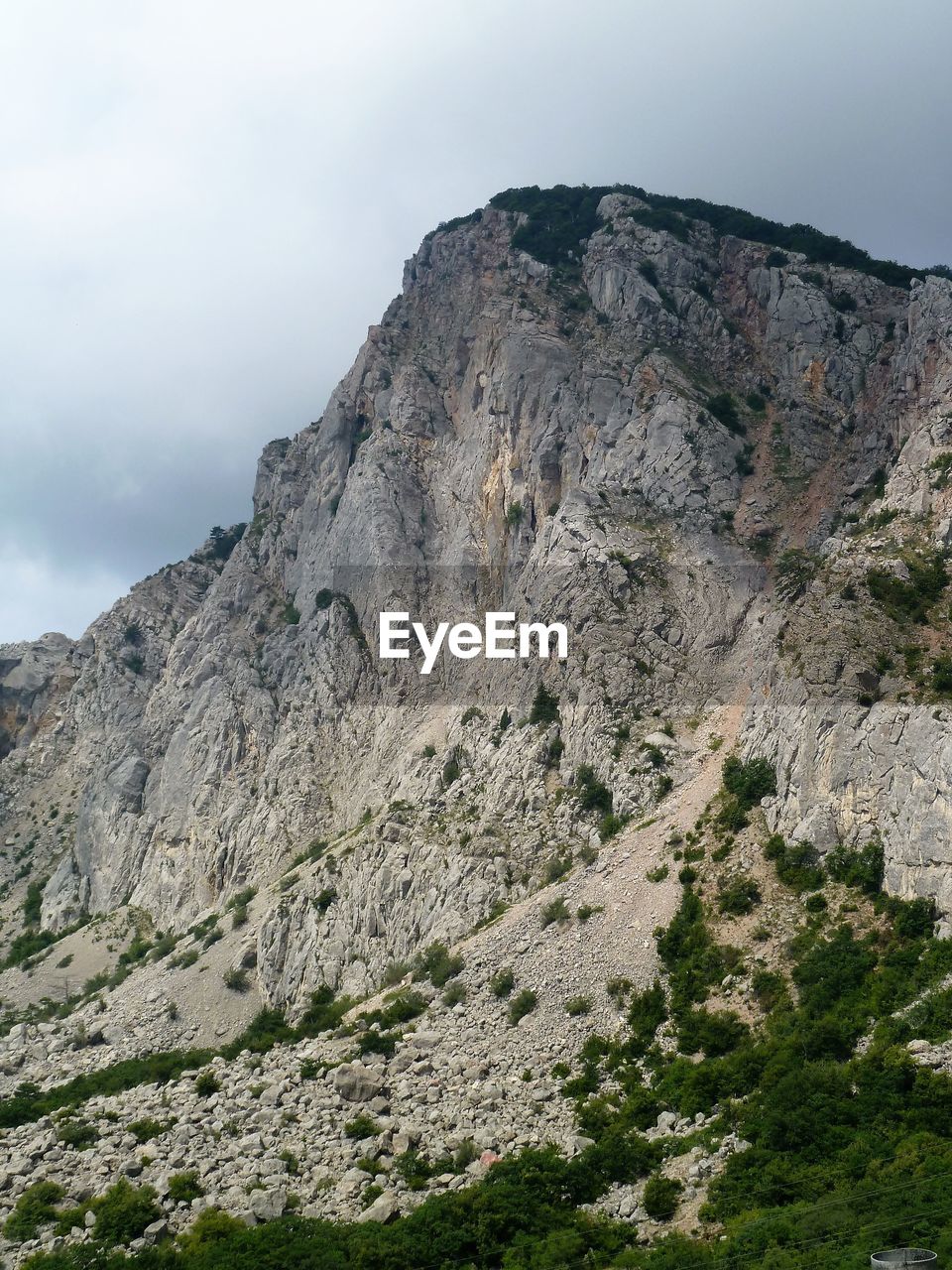 Rock formations on mountain against sky