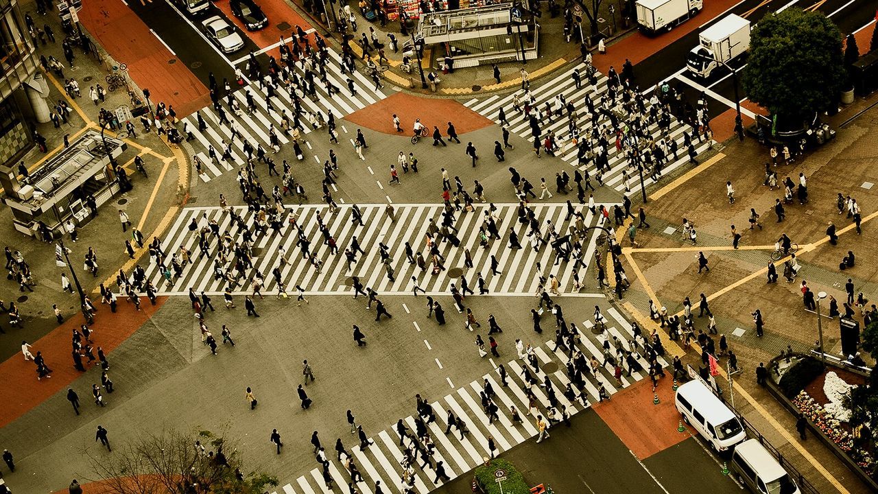 High angle view of crowd crossing road