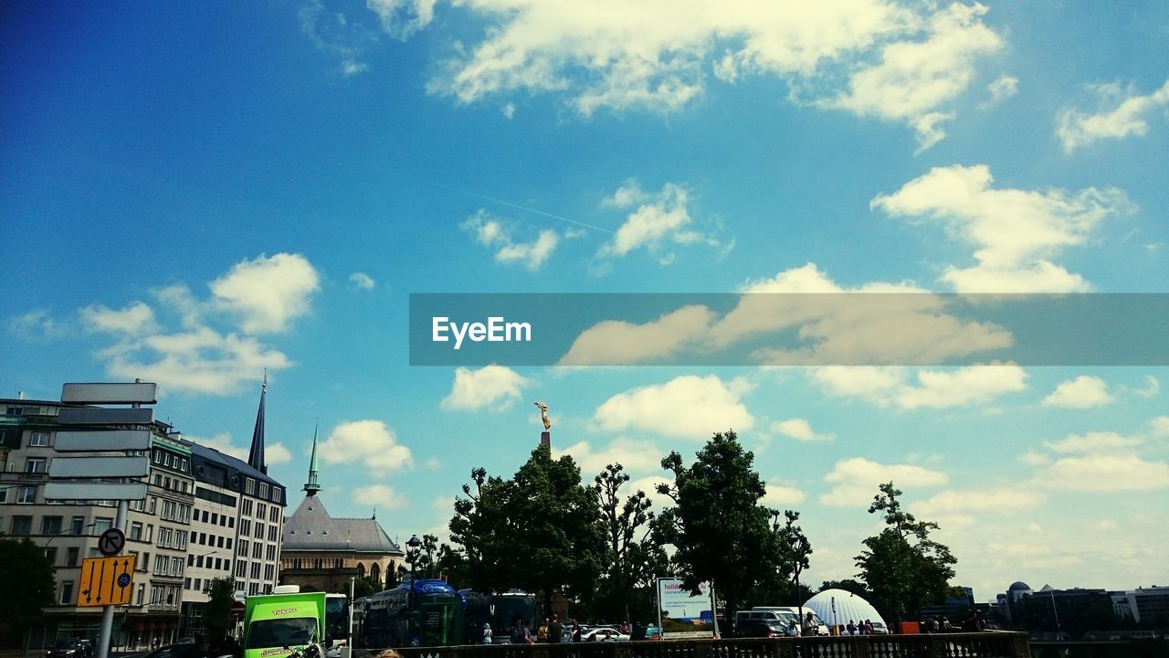 Low angle view of buildings against sky in city