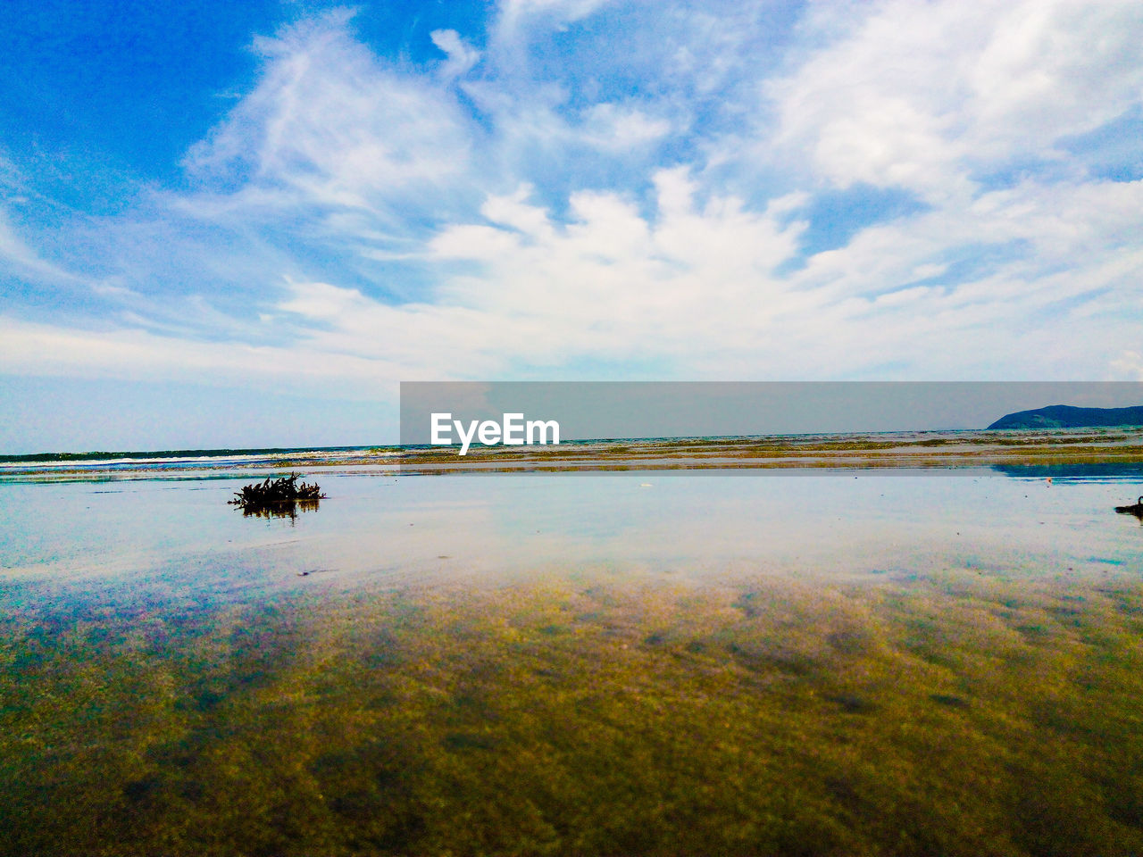 Reflection of clouds in sea