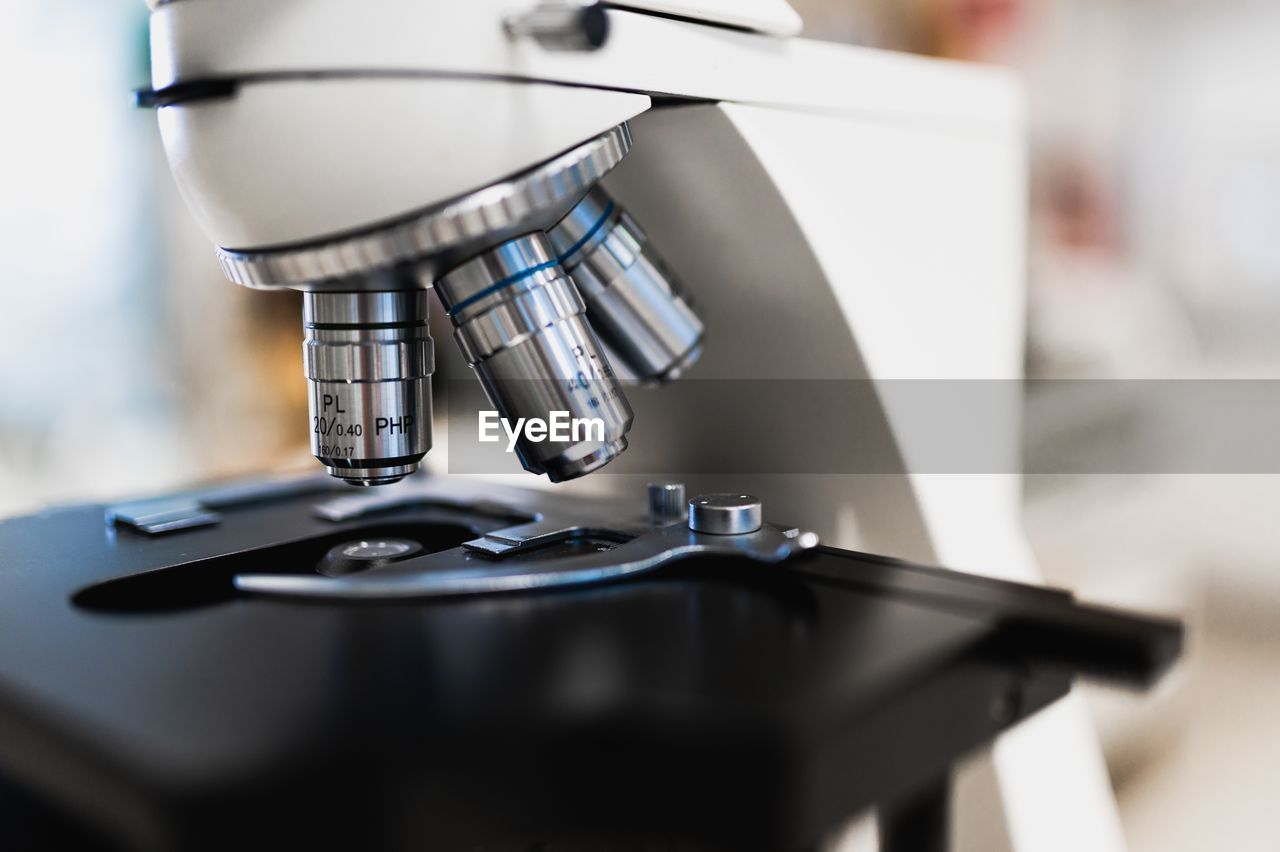 Closeup of contemporary professional microscope for professional scientific and medical research in modern lab