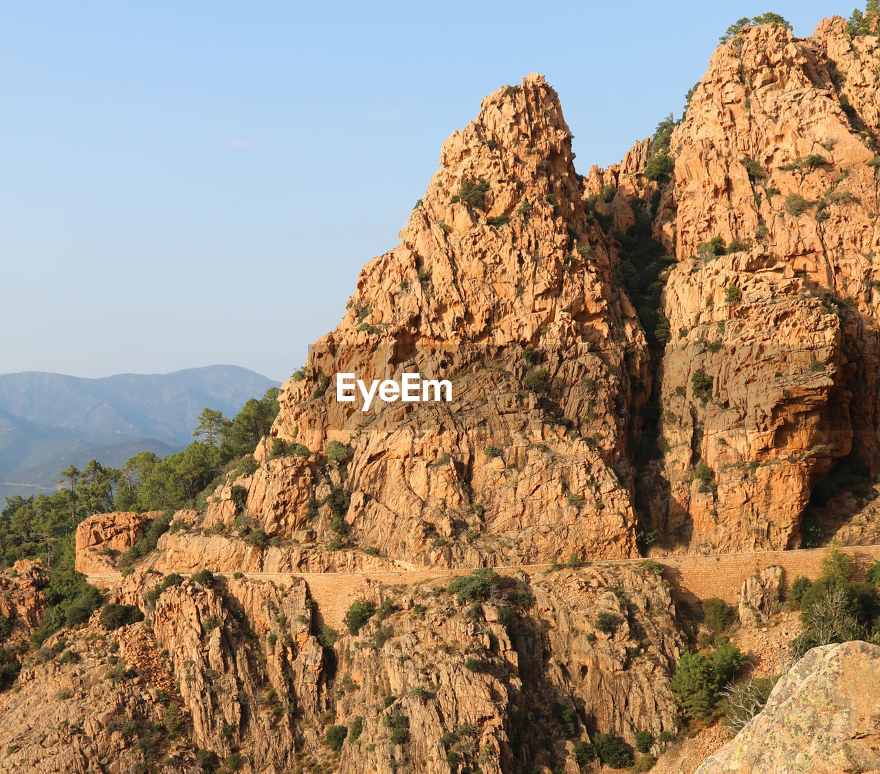 PANORAMIC VIEW OF ROCK FORMATIONS AGAINST SKY