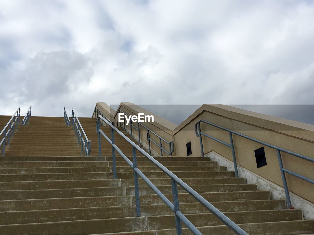 Low angle view of stairs against sky