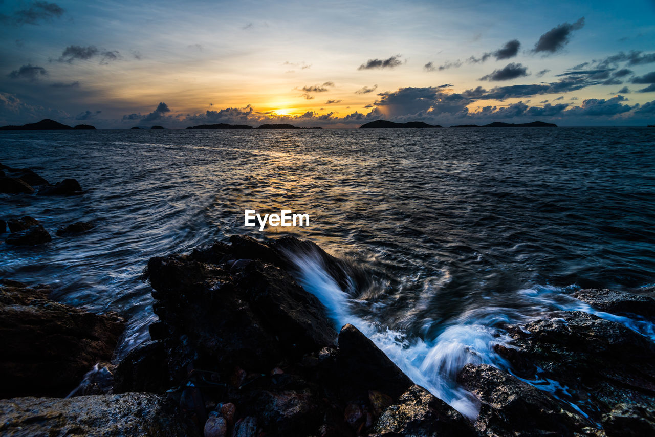 Scenic view of sea against sky during sunset