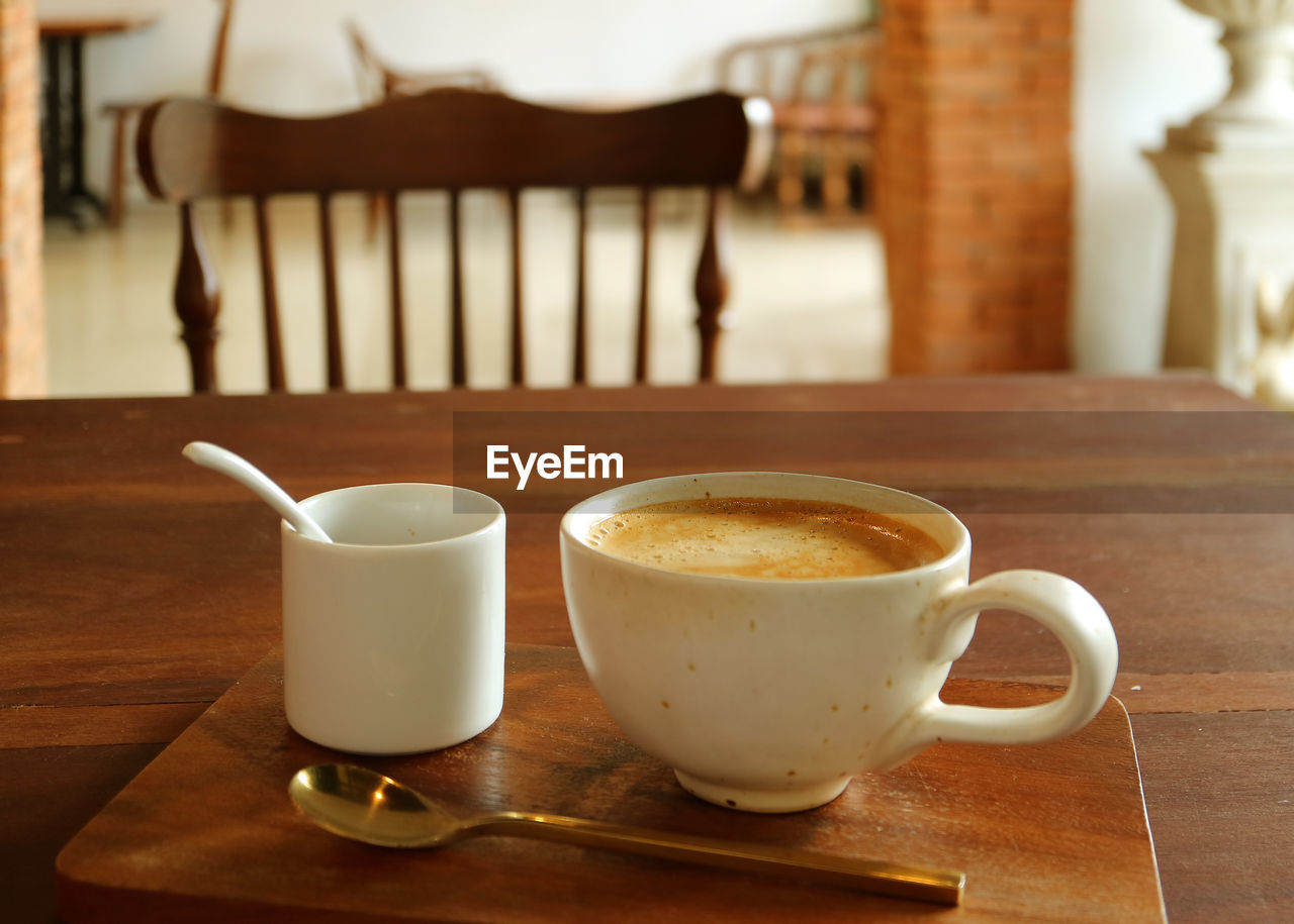 Close-up of coffee cup on table