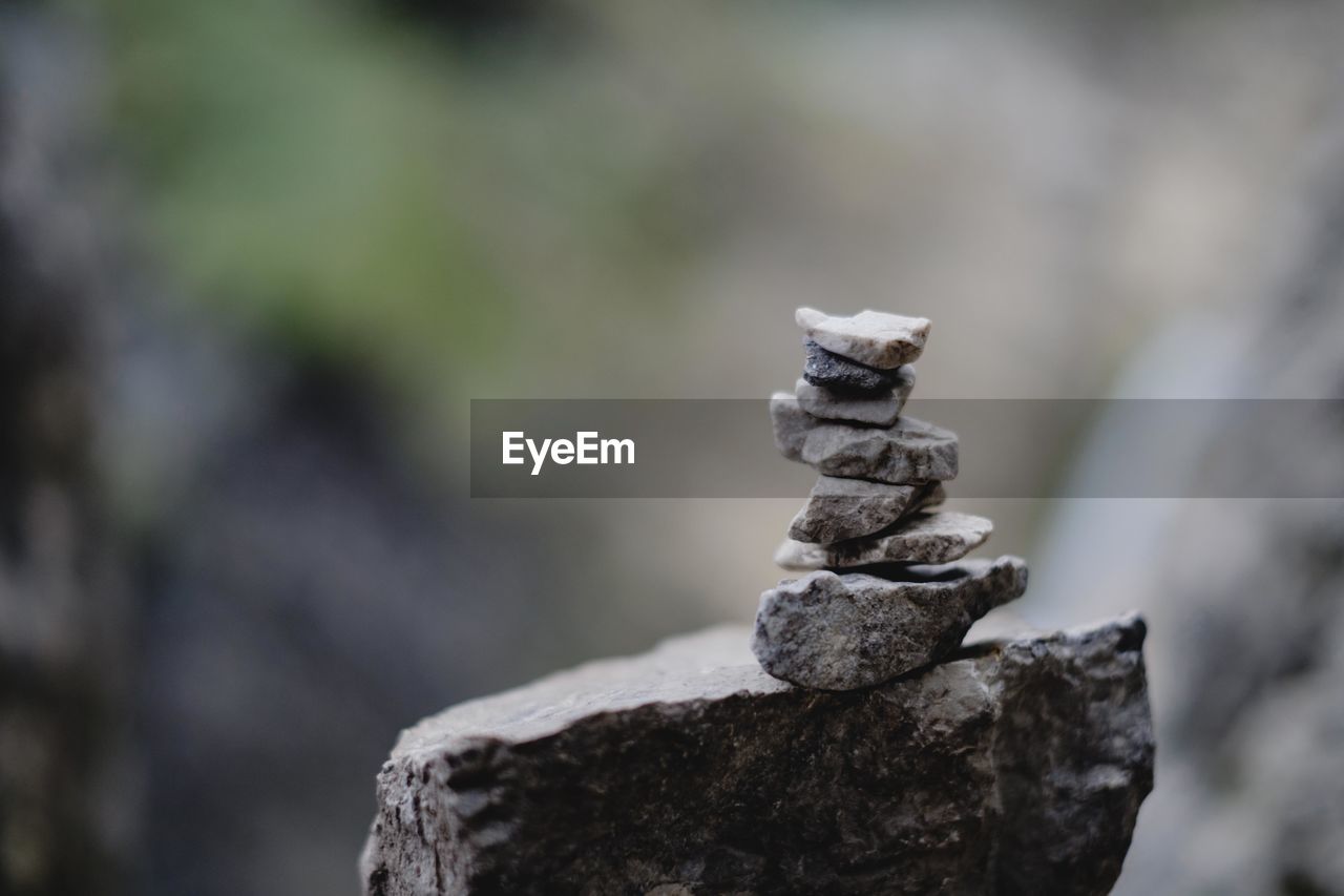 Close-up of stone stack on rock