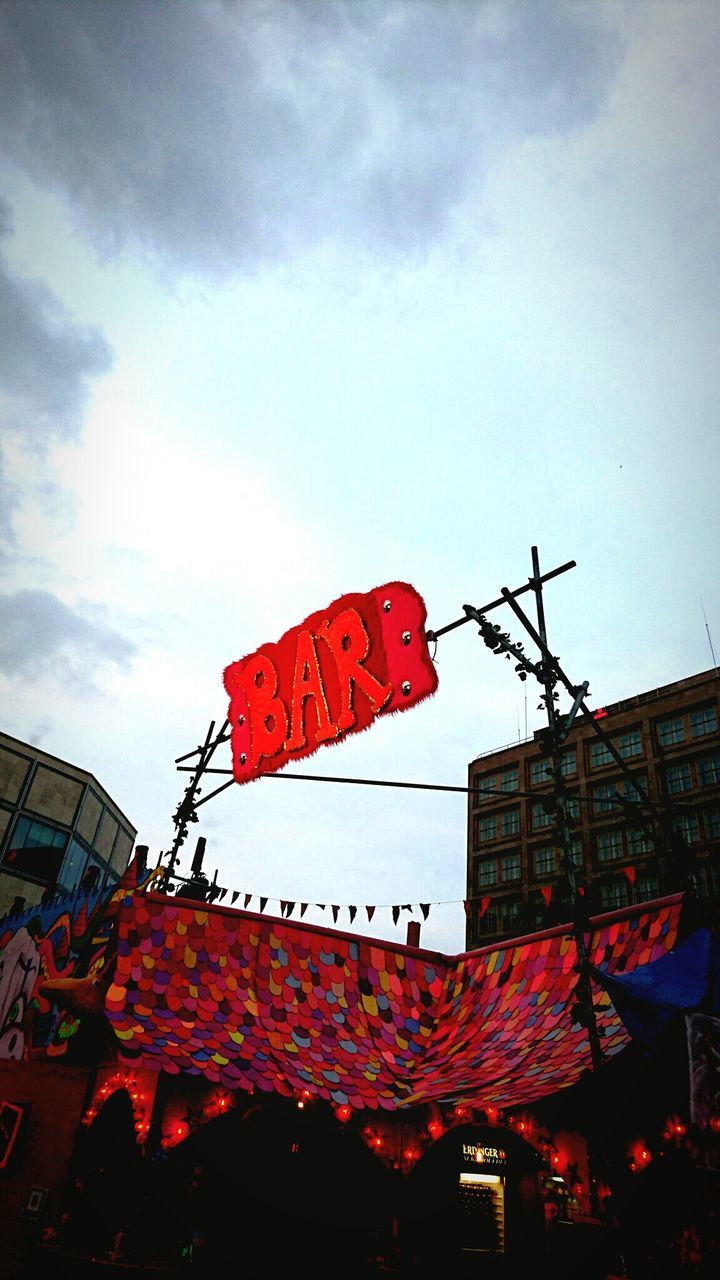 LOW ANGLE VIEW OF BUILDINGS AGAINST SKY