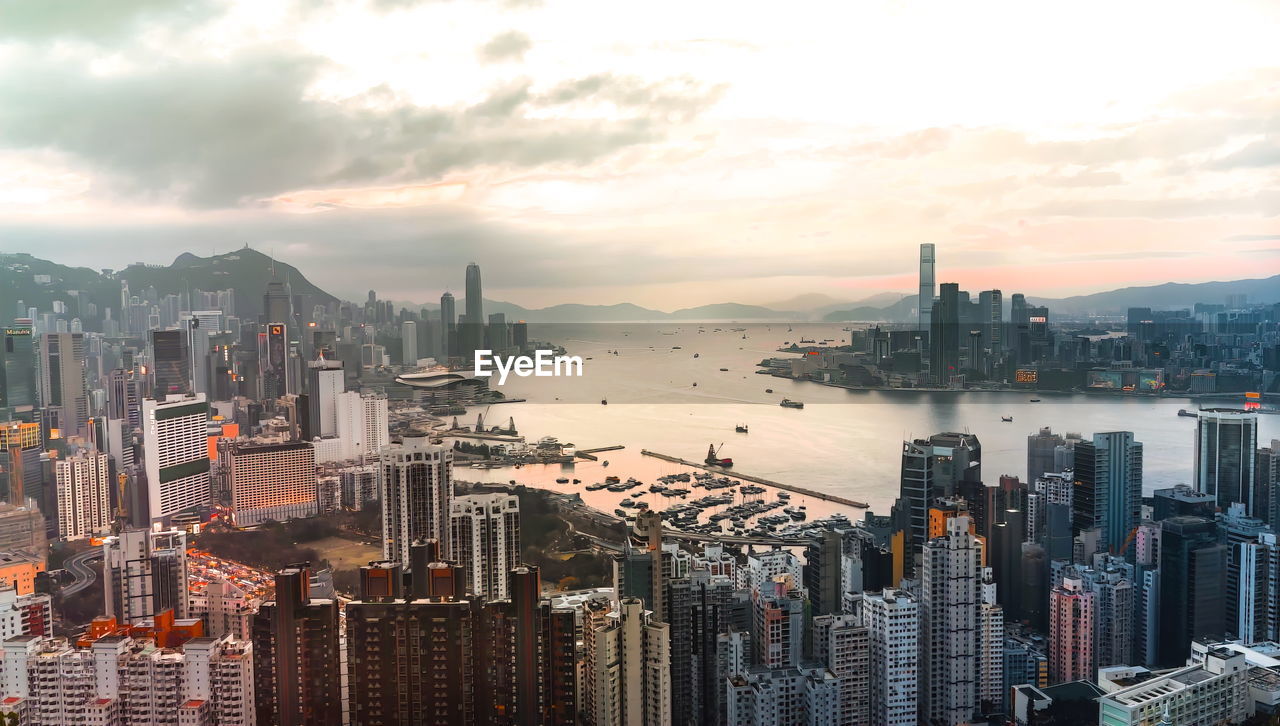 Panoramic view of buildings against sky during sunset