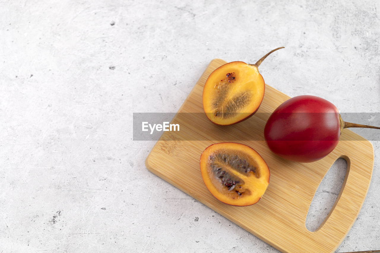 high angle view of fruits on cutting board