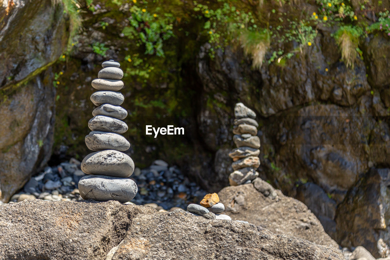 STACK OF STONES ON ROCK