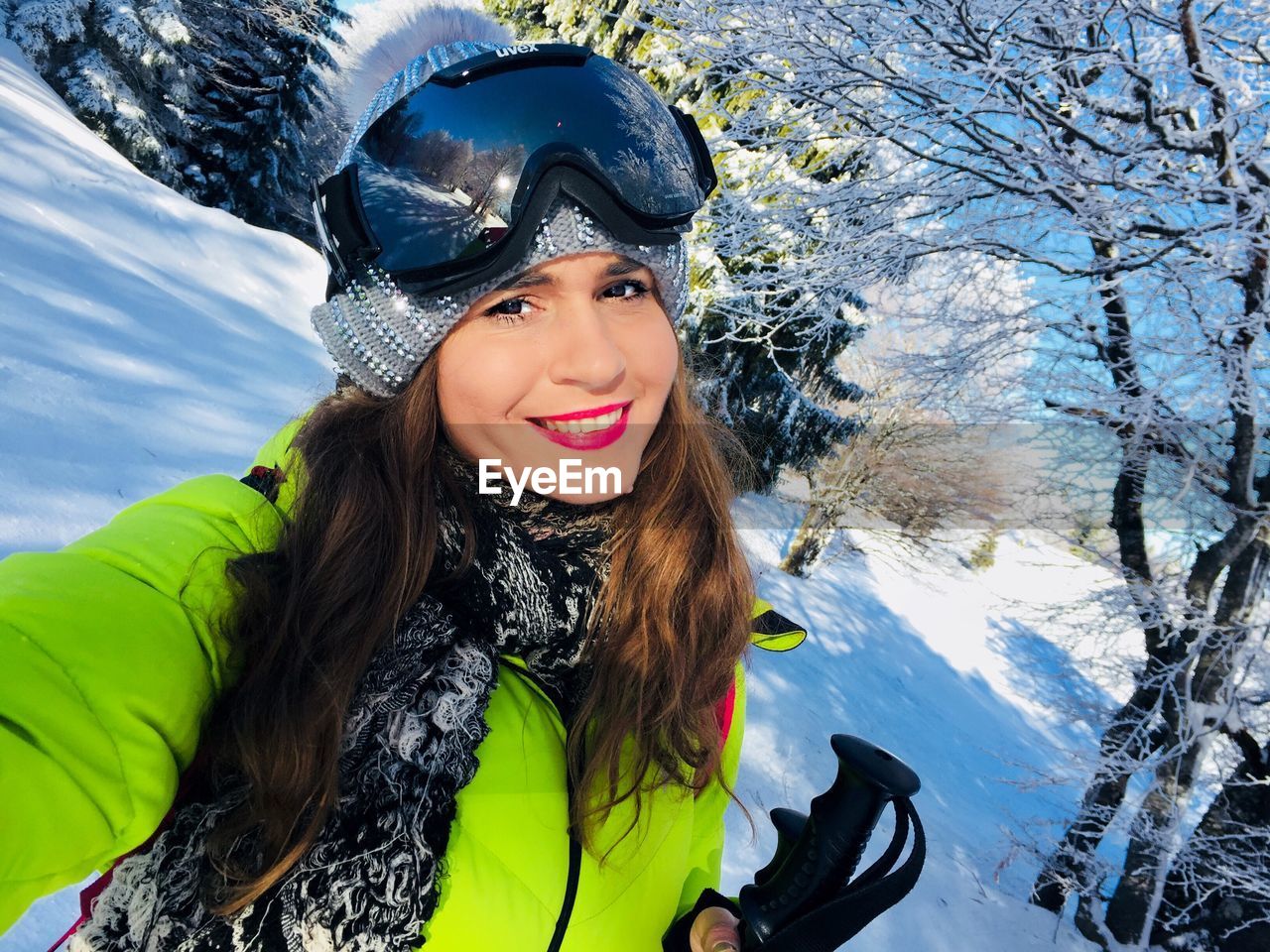 PORTRAIT OF YOUNG WOMAN IN SNOW