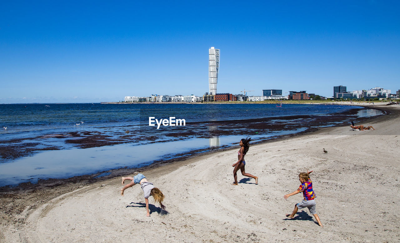 VIEW OF PEOPLE ON BEACH