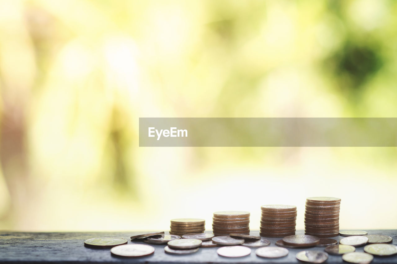 Close-up of coins on table