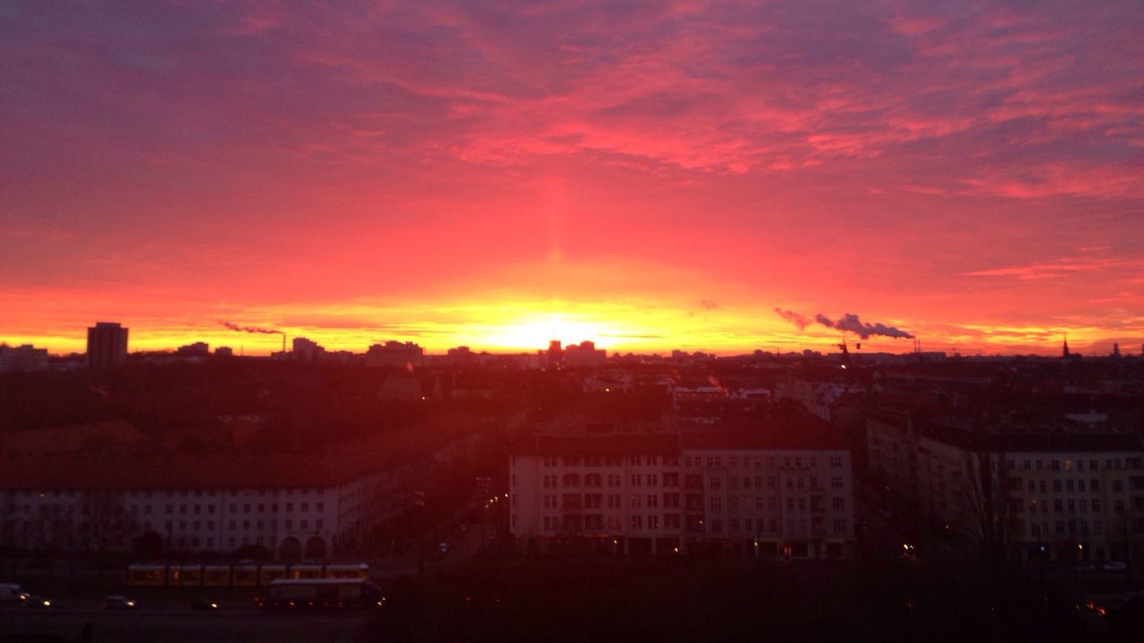 VIEW OF SUNSET OVER CITY