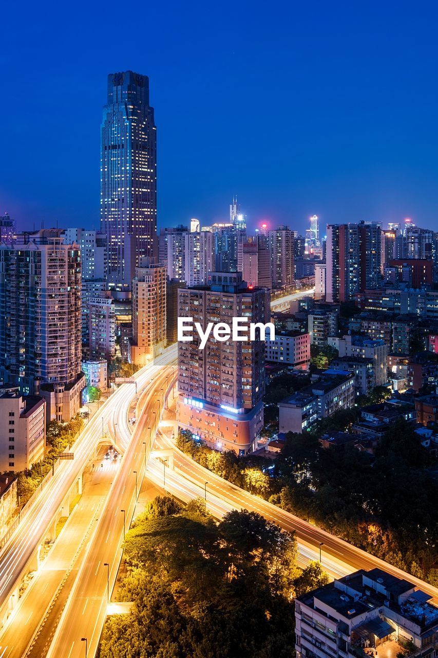 High angle view of illuminated cityscape at night