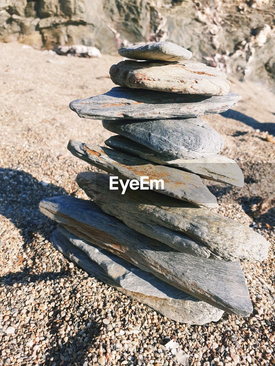 HIGH ANGLE VIEW OF STONE STACK ON ROCKS