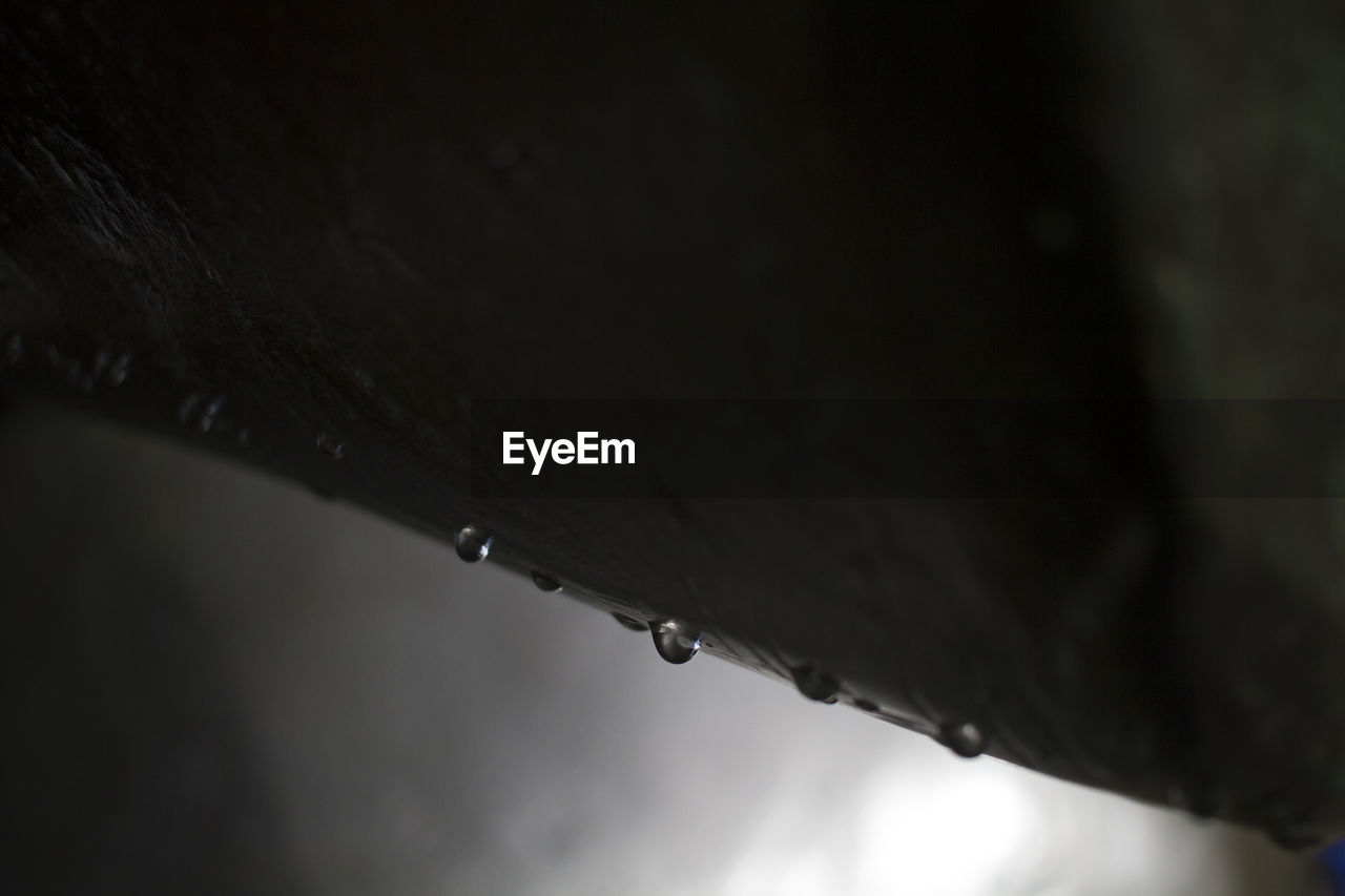 CLOSE-UP OF WATERDROPS ON WET SNOW
