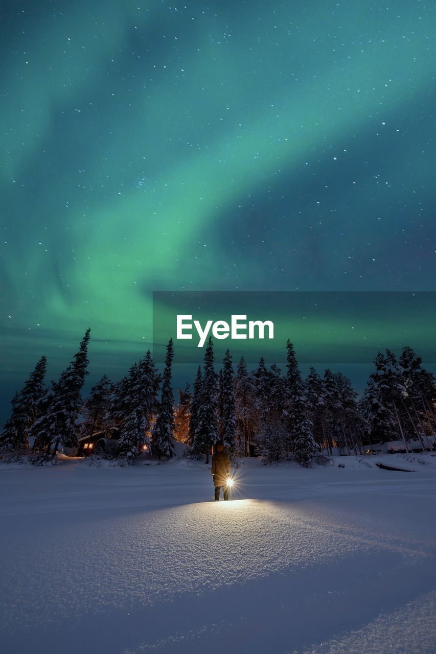 scenic view of snowcapped mountains against sky at night