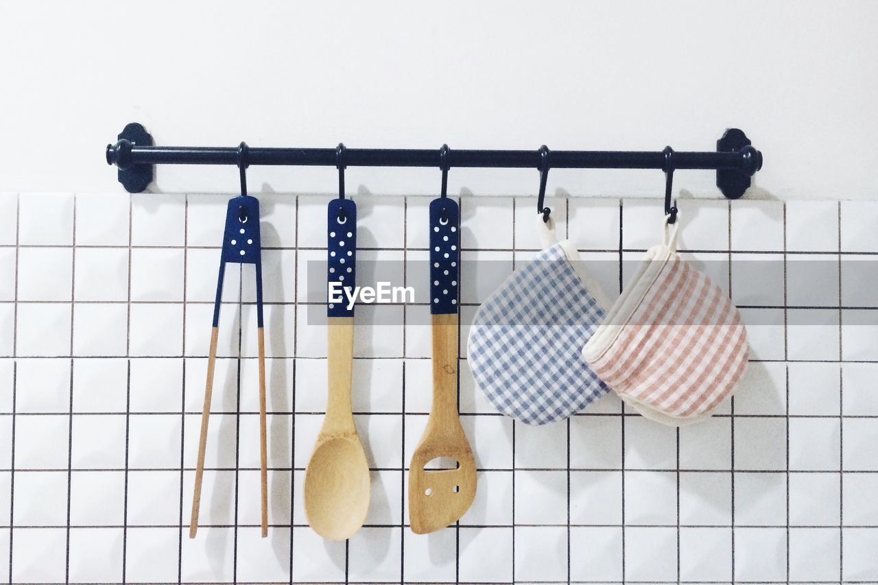 Kitchen utensils hanging on wall