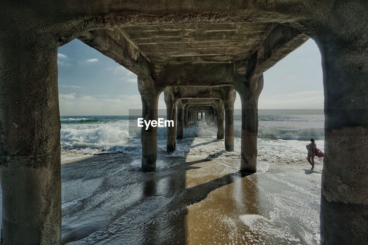 MAN LOOKING AT VIEW OF SEA