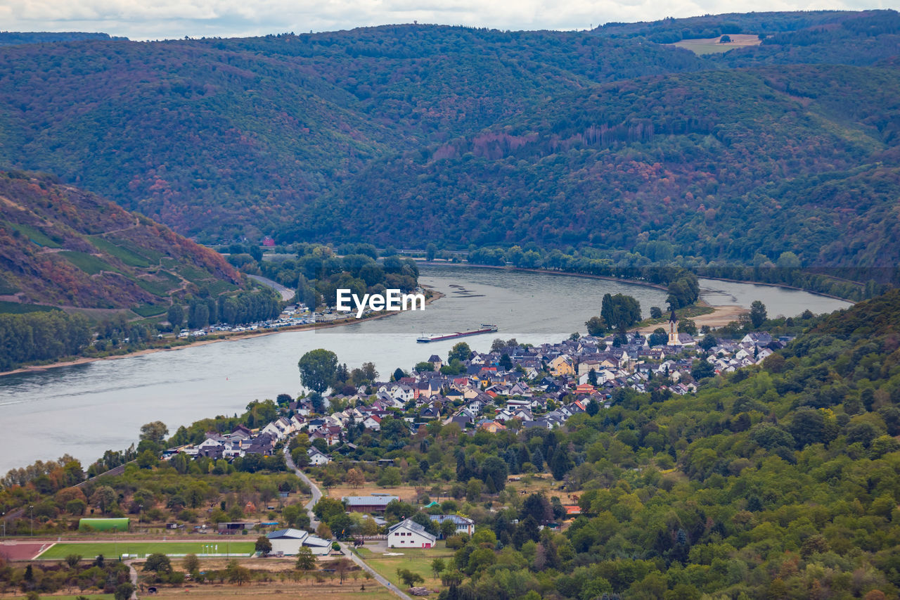 HIGH ANGLE VIEW OF TOWNSCAPE AND MOUNTAIN