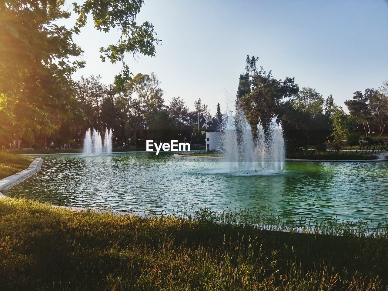 FOUNTAIN IN FRONT OF WATER