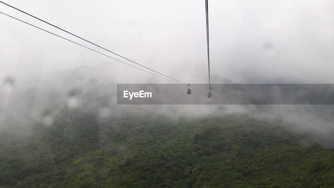 Power lines in foggy weather