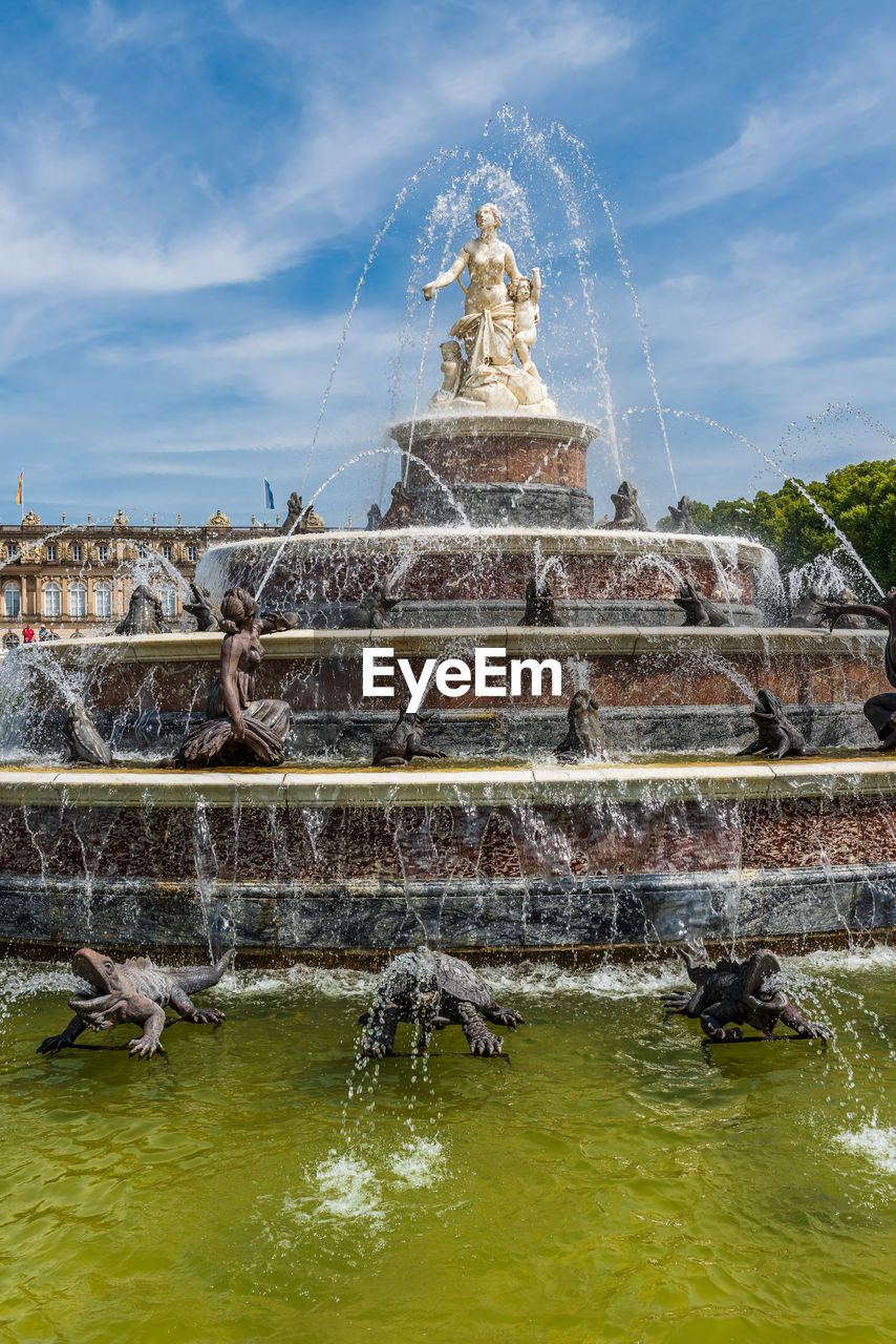 Fountain of latona against cloudy sky